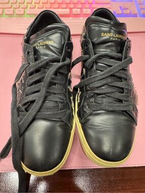 Saint Laurent Black Leather Sneakers with Gold Accent Sole